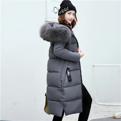 Nivara - a long winter coat with a luxurious faux fur collar